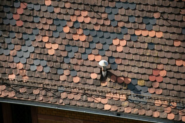 a roof with a lamp on top of it